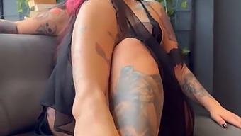 A Tattooed Woman With A High Sex Drive Displays Her Physique